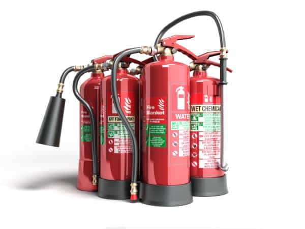 various types of fire extinguishers against a white background